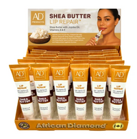 Thumbnail for A retail display box filled with small AD Products Lip Repair Shea Butter tubes, with the main package card behind them showing the brand and product name on a white background.