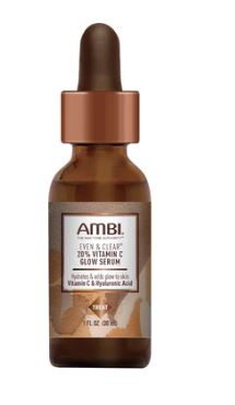 A bottle of AMBI EVEN & CLEAR 20% VITAMIN C GLOW SERUM with a dropper cap.