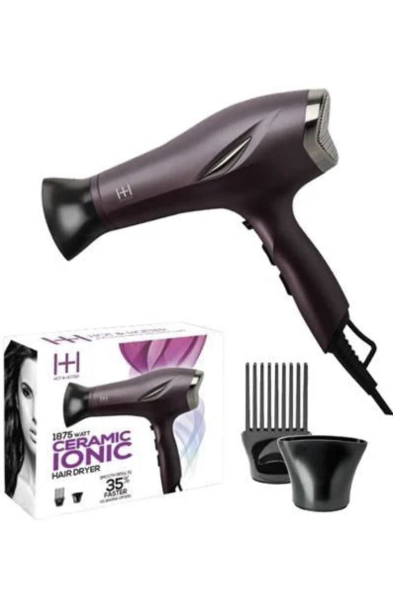 Hair dryer with attachments and packaging on a white background