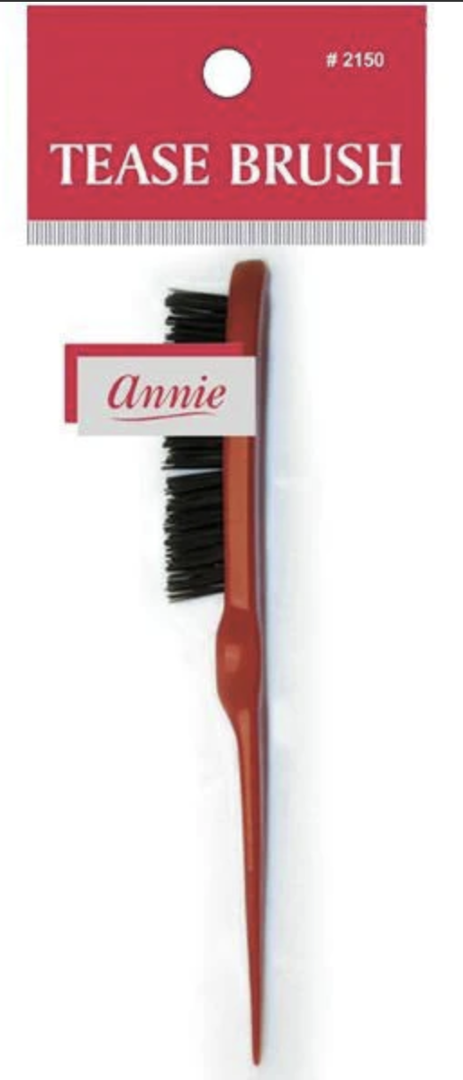 Tease brush with red packaging labeled 'Annie' on a white background