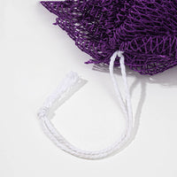 Thumbnail for Close-up of a purple net bag with a white drawstring on a light gray background