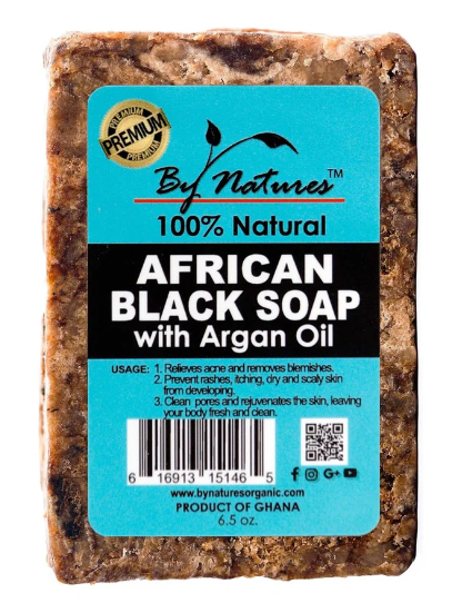 Bar of African Black Soap with By Nature's label on a white background