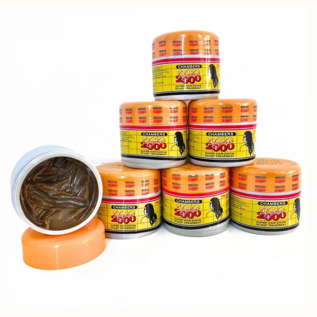 Stack of Chambers 2000 hair products with one open showing a brown substance.