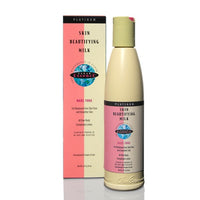 Thumbnail for A bottle of Clarins Skin Beautifying Milk Next-Tone alongside its pink and cream packaging box, set against a plain white background.