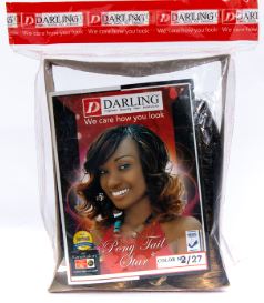 Packaged hair product with a woman's face on the label, featuring the brand 'Darling'.