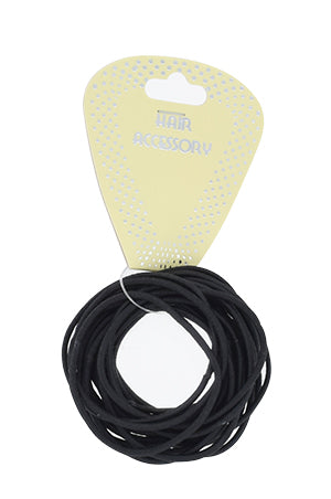 Black hair ties on a white background with a yellow comb