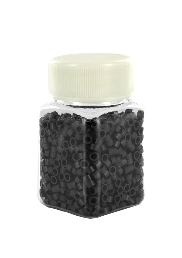 Jar of black rubber bands with a white lid on a white background