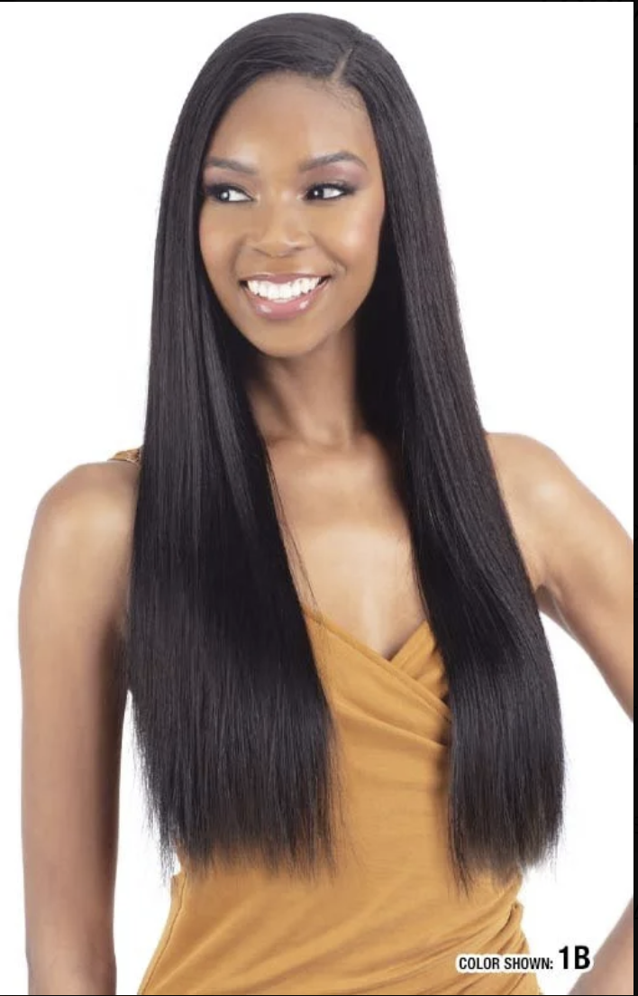 A smiling woman with long, straight, black hair wearing a mustard yellow top, shown against a plain white background. Text in the bottom right corner reads 'COLOR SHOWN: 1B'.