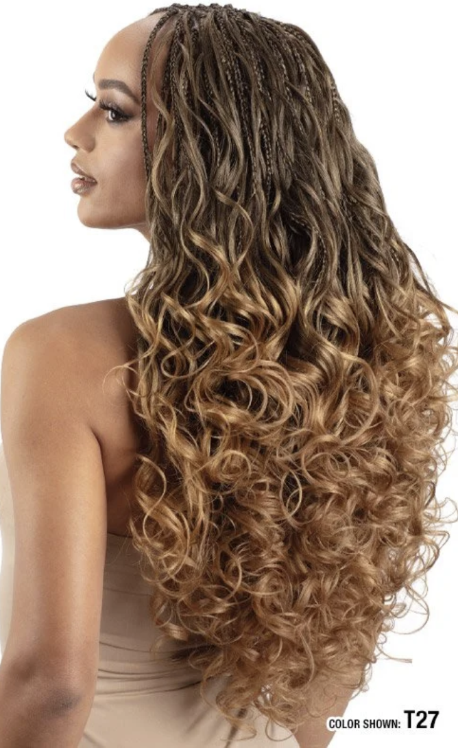Woman with long, wavy hair styled in a side part on a white background