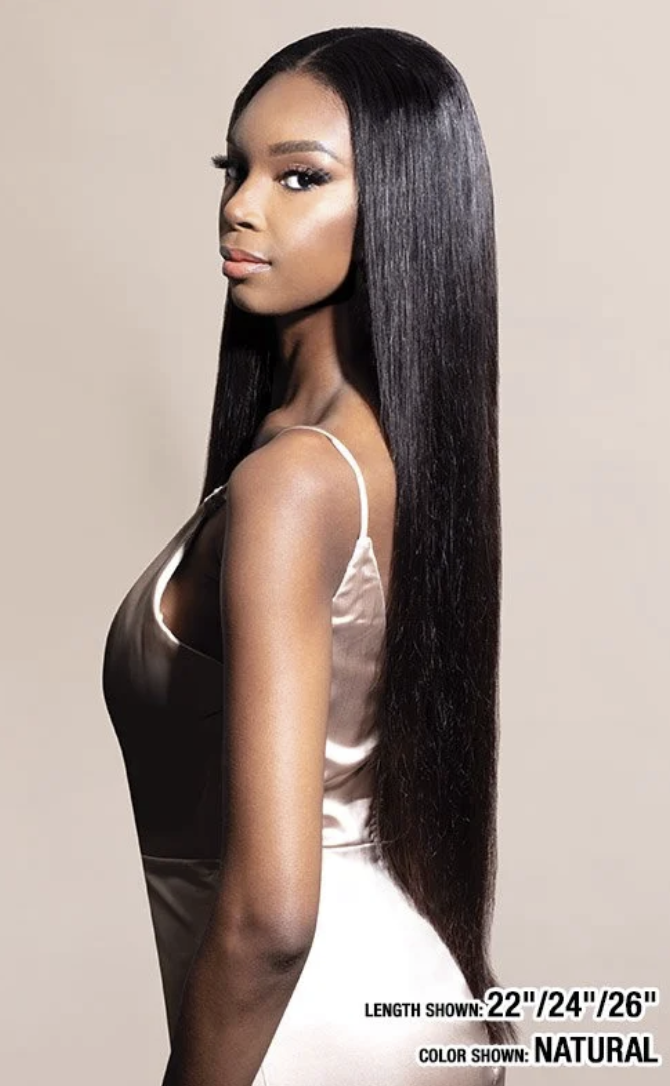 A woman with long, straight, glossy black hair is shown in side profile against a plain beige studio background. Text at the bottom reads 'LENGTH SHOWED: 22"/24"/26"' and 'COLOR SHOWED: NATURAL'.