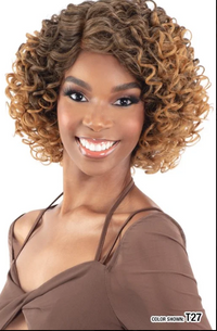 Thumbnail for Woman with styled hair wearing a brown top on a white background