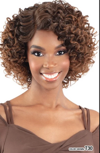 Thumbnail for Woman with styled hair wearing a brown top on a white background