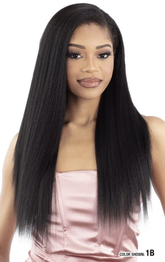 A woman modeling a long, straight black wig with a natural-looking hairline, wearing a light pink satin top against a plain white background.