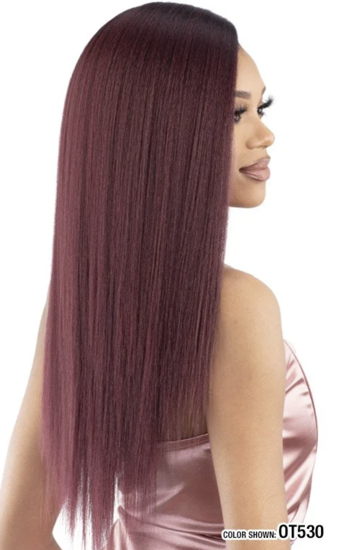 A woman shown in side profile wearing a long, straight wig in a deep auburn-brown shade. The wig is the product being sold, and the model's skin and pink satin top are incidental.