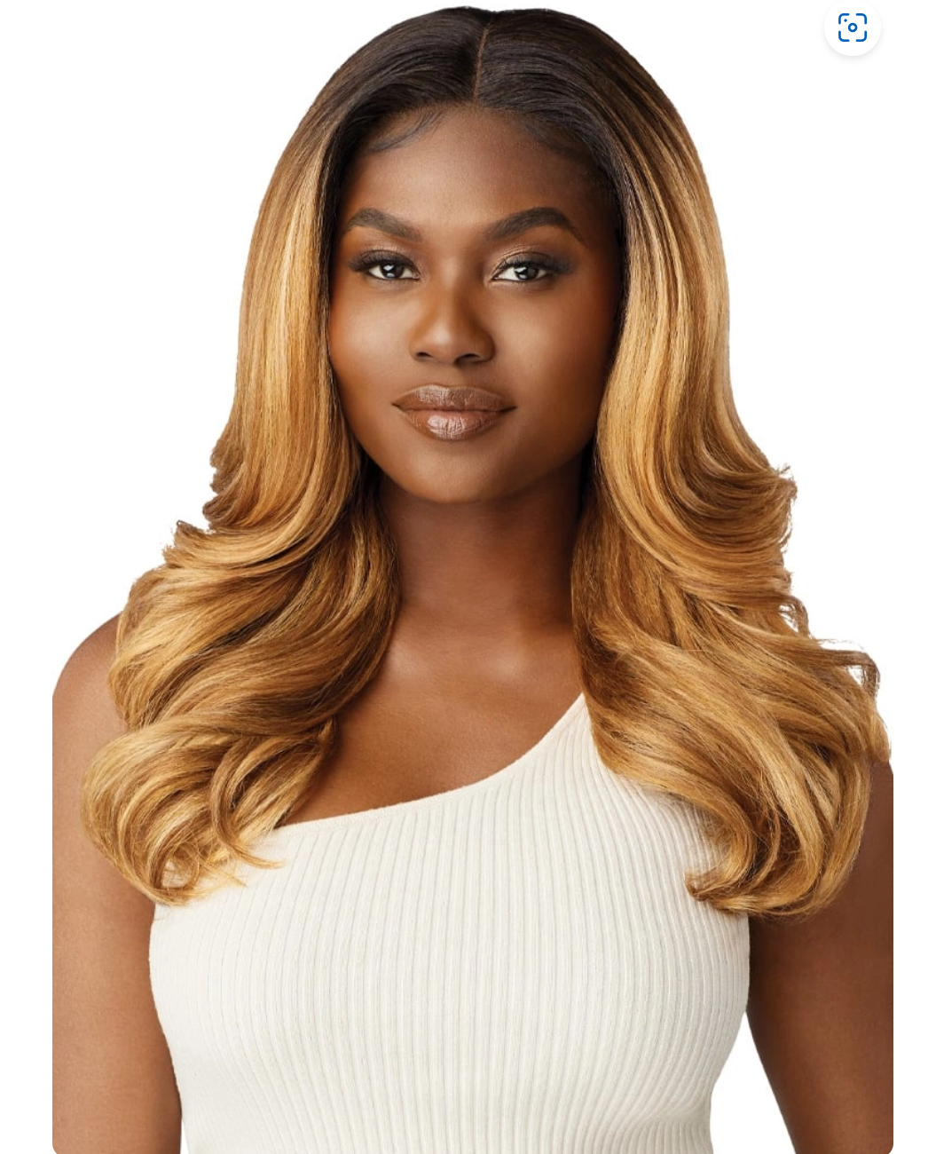 Woman with long, wavy, ombre hair wearing a white top on a white background