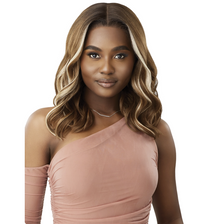 Thumbnail for A woman with shoulder-length, wavy blonde-highlighted hair is shown from the shoulders up against a plain white background, wearing a dusty pink one-shoulder top.