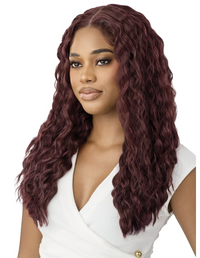 Thumbnail for Woman with long, wavy, burgundy-colored hair wearing a white top.