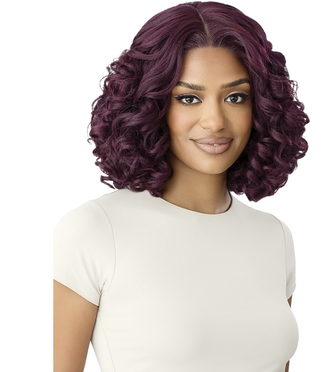 OUTRE Melted Hairline Lace Front Wig -MH 132 Woman with curly purple hair wearing a white shirt on a white background
