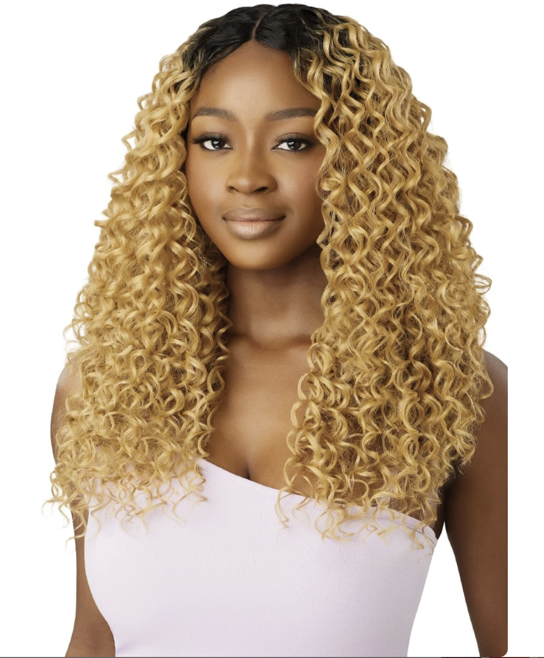 A woman modeling a long, straight wig with tight, glossy curls. The wig features a dark brown root color blending into a warm blonde lengthwise gradient.