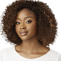 Thumbnail for Woman with curly hair wearing a white top on a white background