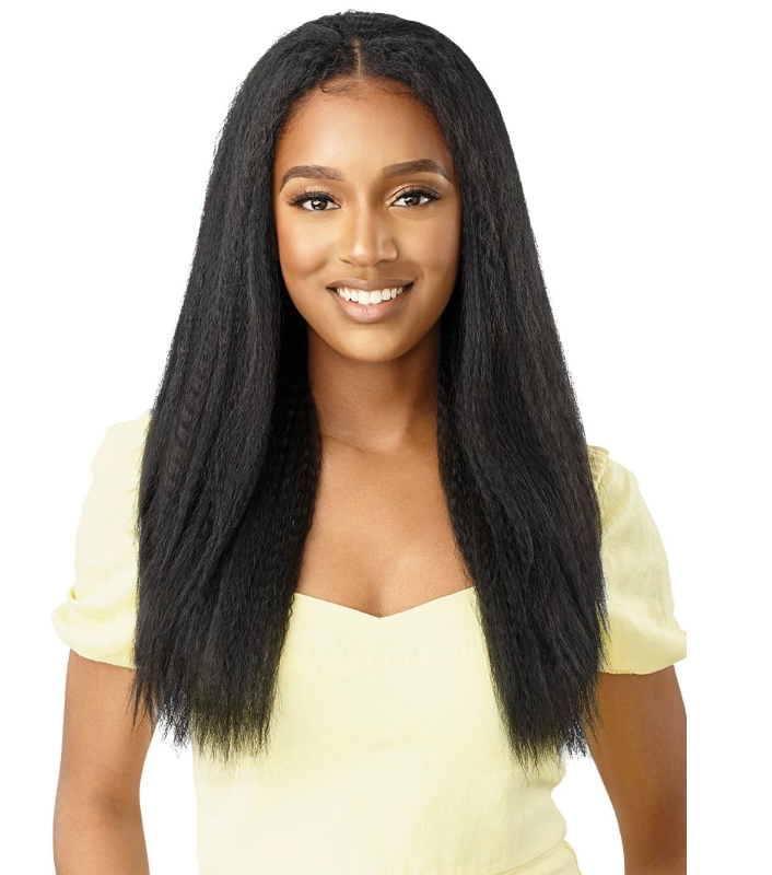 Woman with long black hair wearing a yellow top on a white background