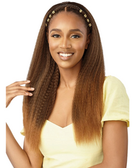 Thumbnail for Woman with long, straight hair wearing a yellow top on a white background