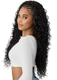 Thumbnail for Woman with long, styled hair wearing a white top on a white background