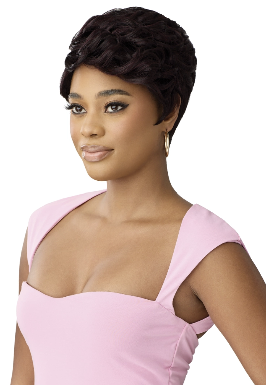 Woman wearing a pink top with a white background