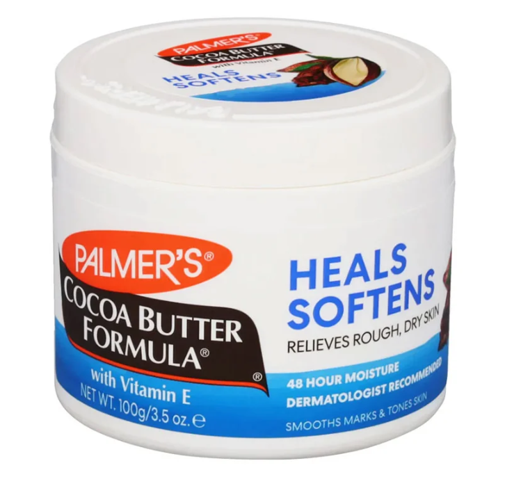 A white plastic jar of Palmer's Cocoa Butter Formula Heals Softens moisturizer with blue and orange text on the label, shown against a plain white background.