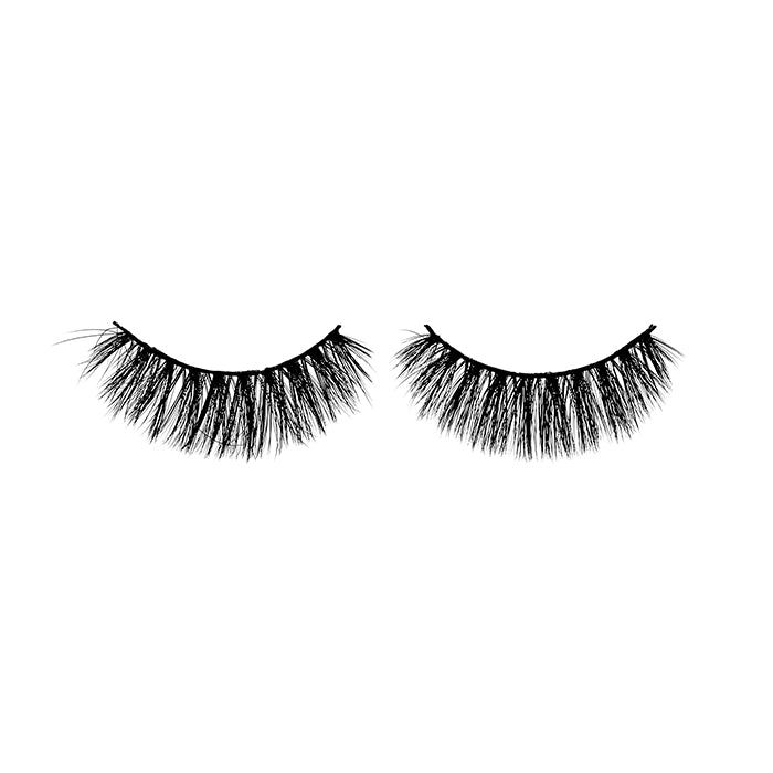 A pair of false eyelashes against a white background, showcasing dense, voluminous black lashes typical of a full eye makeup look.