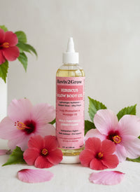 Thumbnail for Bottle of Reviv2Grow Hibiscus Glow Body Oil on a gray background