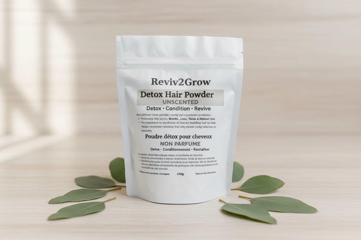 Reviv2Grow Detox Hair Powder package on a light background with eucalyptus leaves.