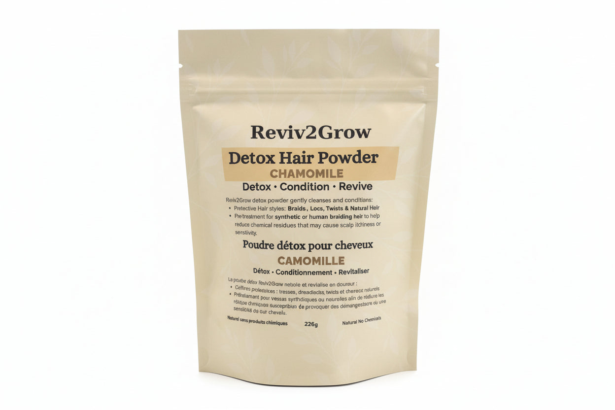 Reviv2Grow Detox Hair Powder package on a white surface with a blurred background