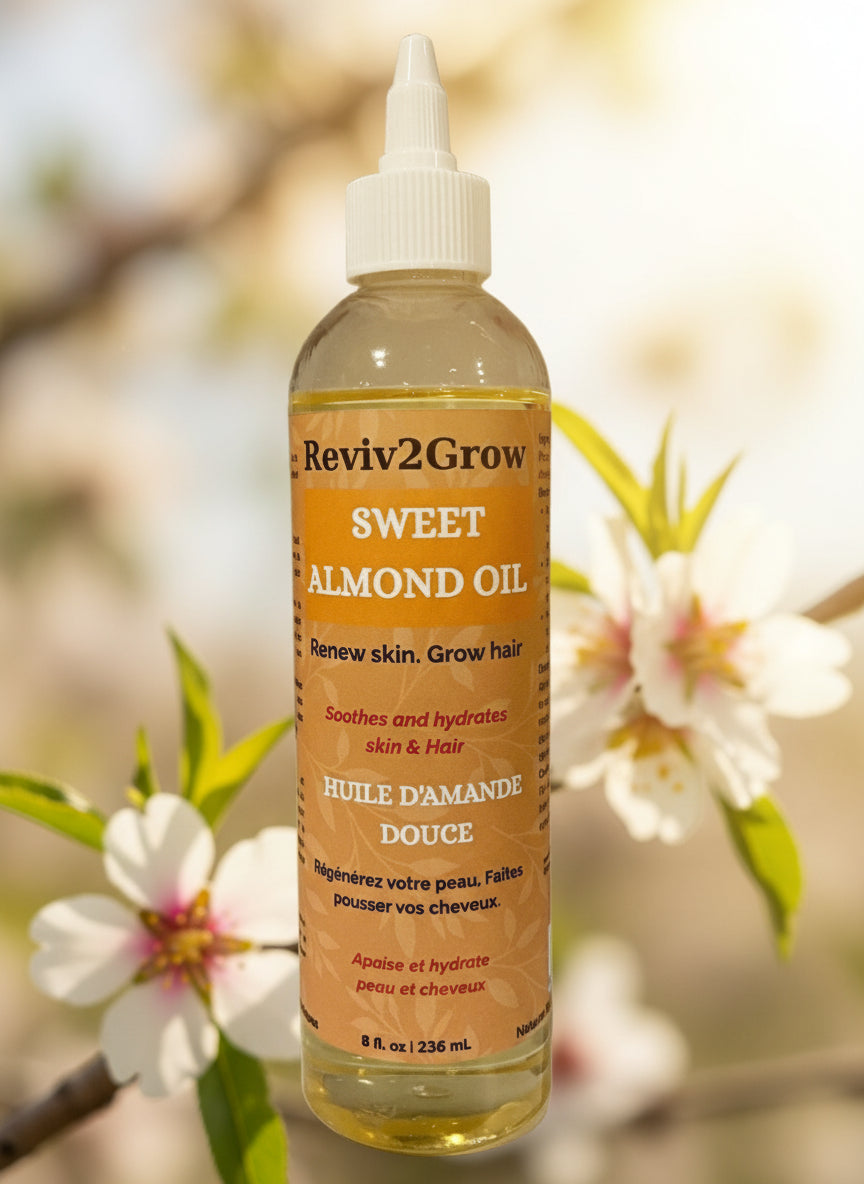 Bottle of sweet almond oil with a label on a neutral background