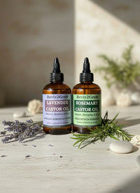 Thumbnail for Two bottles of Reviv2Grow castor oil with different scents on a neutral background