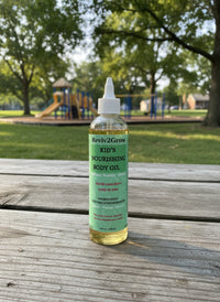 Thumbnail for Bottle of Reviv2Grow Kid's Nourishing Body Oil on a neutral background