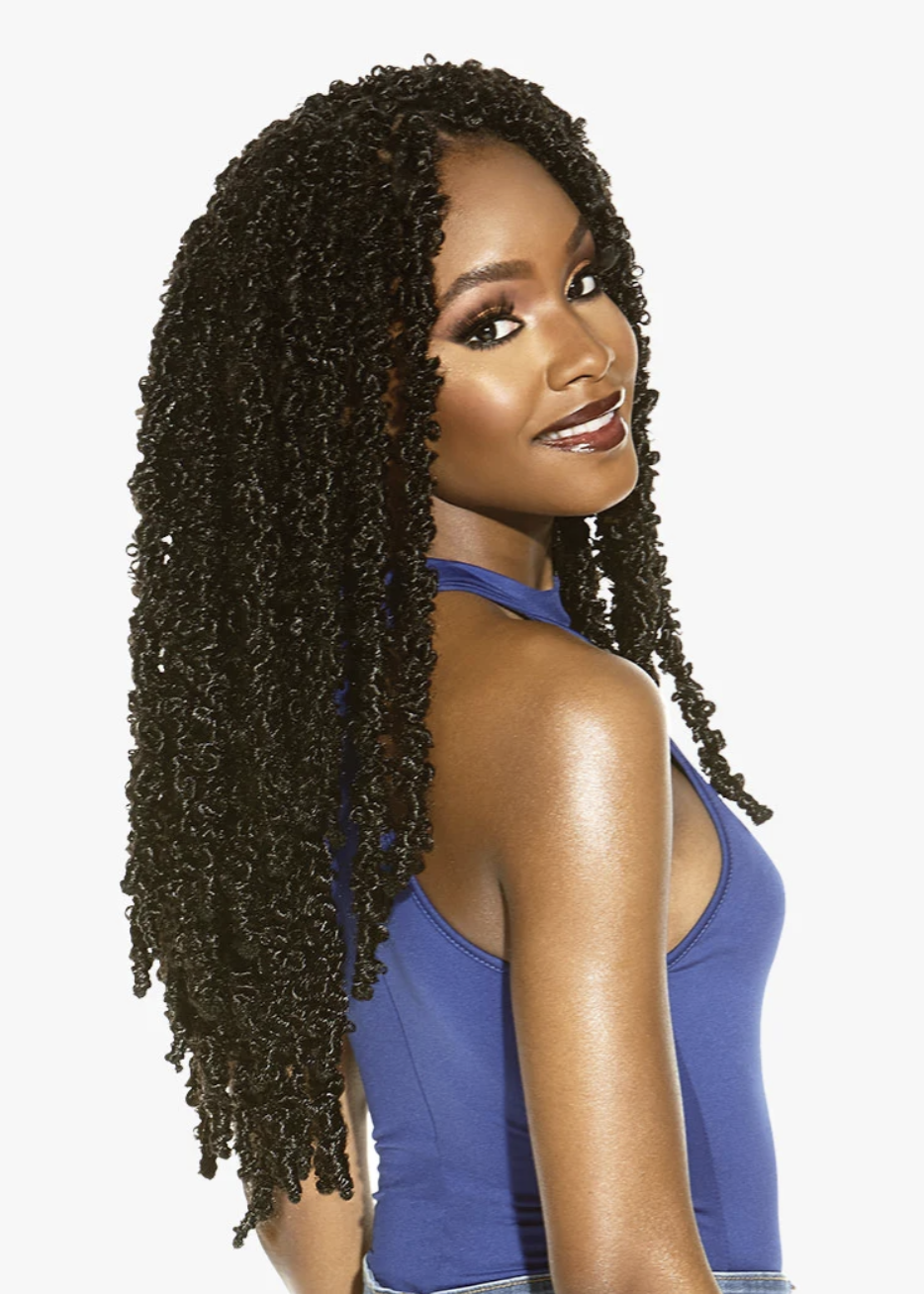 Woman with long, braided hair wearing a blue top on a white background