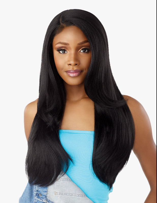 Woman with long black hair wearing a blue top and denim jacket on a white background