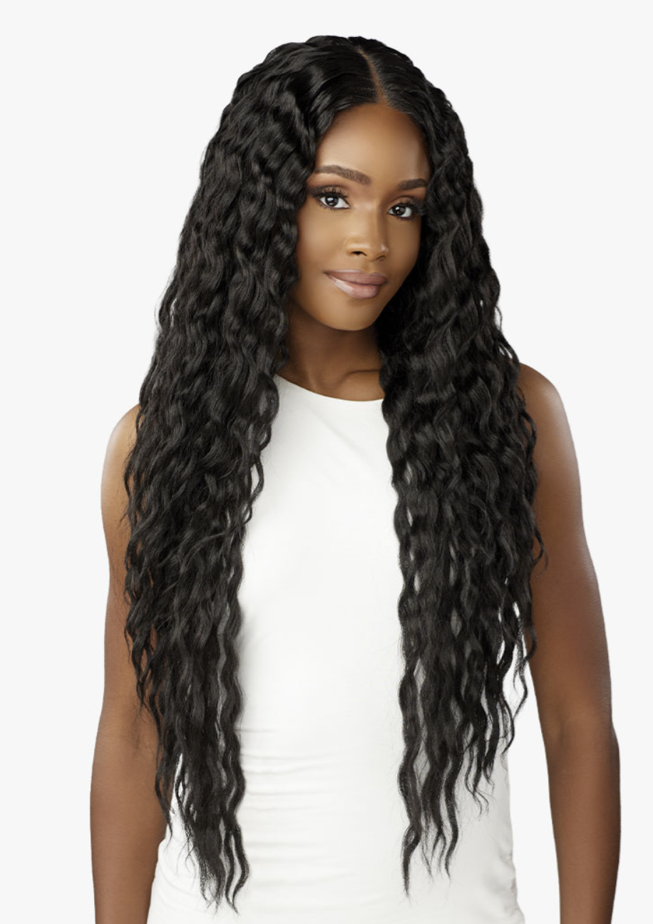 Woman with long, wavy black hair on a white background