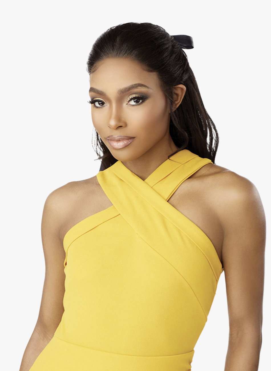 Woman wearing a yellow dress against a white background