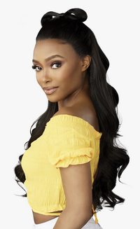 Thumbnail for Woman with styled hair wearing a yellow top on a white background