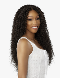 Thumbnail for Woman with long, curly hair wearing a white top on a white background