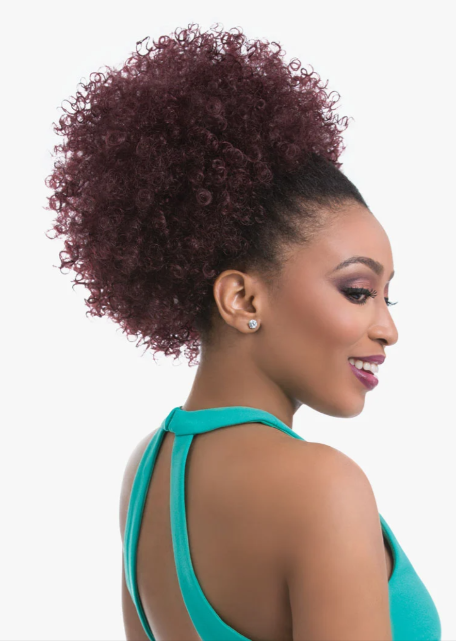 A woman shown from the back and side profile wearing a voluminous, curly high ponytail in a deep burgundy shade, paired with a teal halter top against a plain white background.