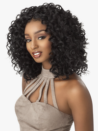 Thumbnail for Woman with styled black hair wearing a beige dress against a white background