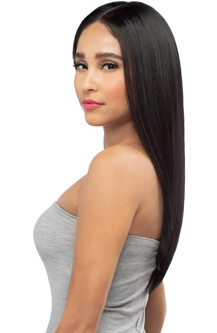 Woman with long black hair wearing a gray strapless top on a white background