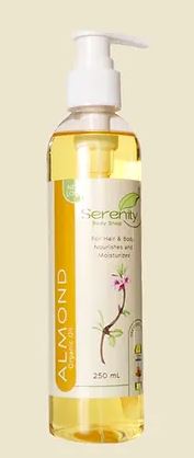 A bottle of Serenity Organic Almond Oil with a white pump dispenser. The label shows the brand name 'Serenity' and the product name 'Almond Oil'.