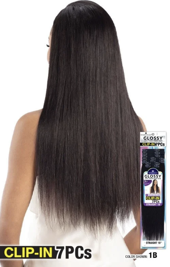 Woman with long straight hair wearing clip-in extensions with a product package on a white background
