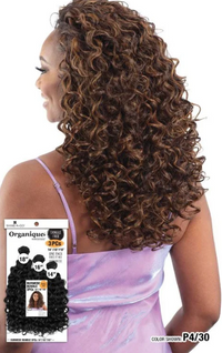 Thumbnail for Woman with curly hair styled in a wig, with a product packaging labeled 'Organiques' in the foreground.
