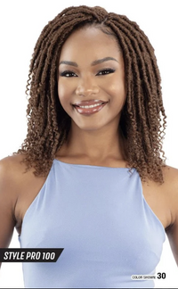 Thumbnail for Woman with styled hair wearing a light blue top on a white background