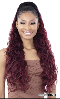 Thumbnail for Woman with long, wavy, burgundy hair on a white background